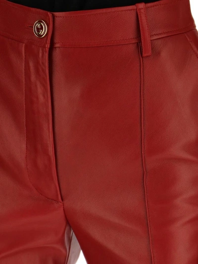 Shop Gucci Plongé Leather Flare Pants In Red