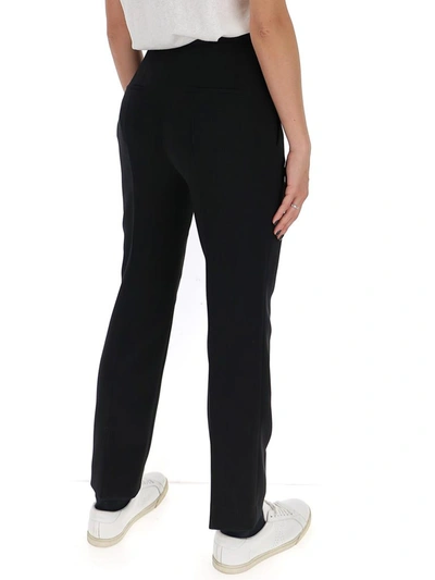 Shop Prada Belted Slim Fit Pants In Black