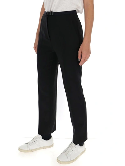 Shop Prada Belted Slim Fit Pants In Black