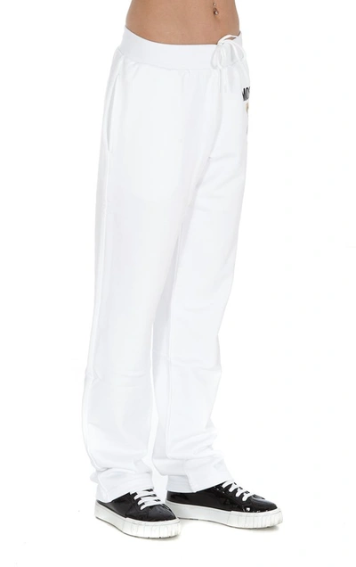 Shop Moschino Italian Teddy Track Pants In White