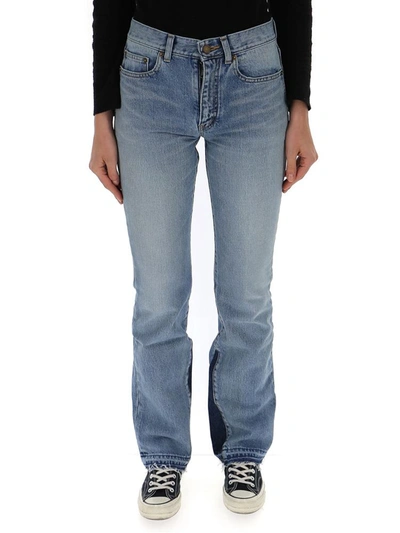 Shop Saint Laurent Flared Contrast Jeans In Blue