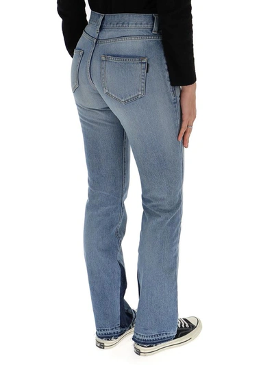 Shop Saint Laurent Flared Contrast Jeans In Blue