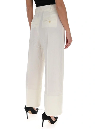 Shop Jacquemus High Waisted Pants In White