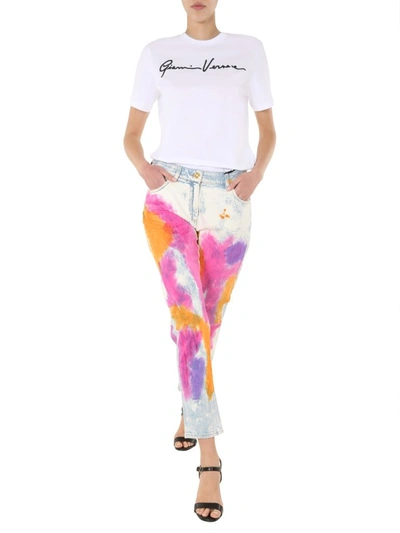 Shop Versace Tie Dye Tapered Jeans In Multi