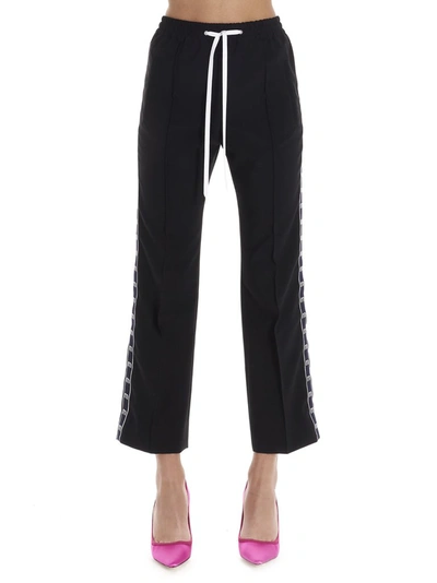 Shop Miu Miu Side Logo Striped Track Pants In Black