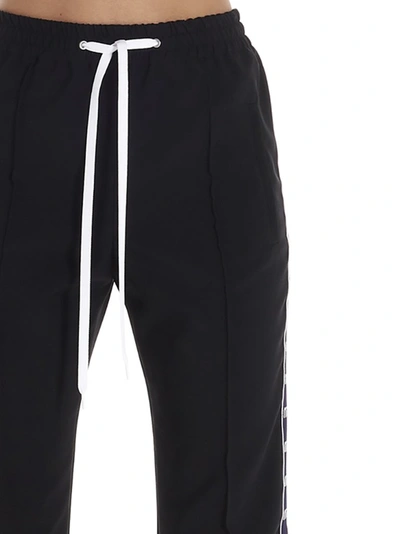 Shop Miu Miu Side Logo Striped Track Pants In Black
