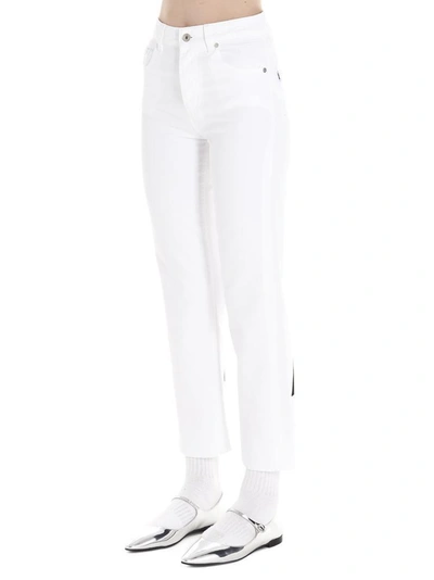 Shop Msgm Logo Print Denim Jeans In White