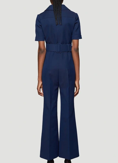 Shop Gucci Gg Logo Belted Jumpsuit In Blue