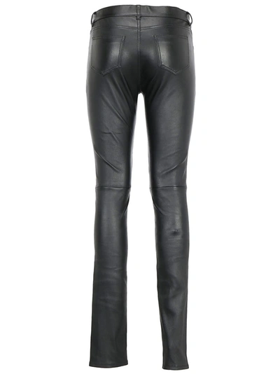 Shop Saint Laurent Skinny Leather Pants In Black