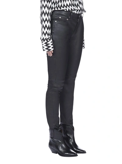 Shop Saint Laurent Skinny Leather Pants In Black