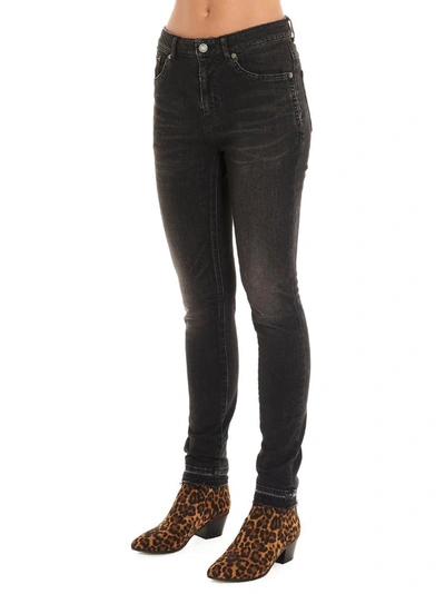 Shop Saint Laurent Skinny Frayed Edge Jeans In Black