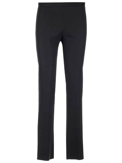 Shop Versace Flared Pants In Black