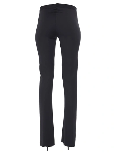 Shop Versace Flared Pants In Black