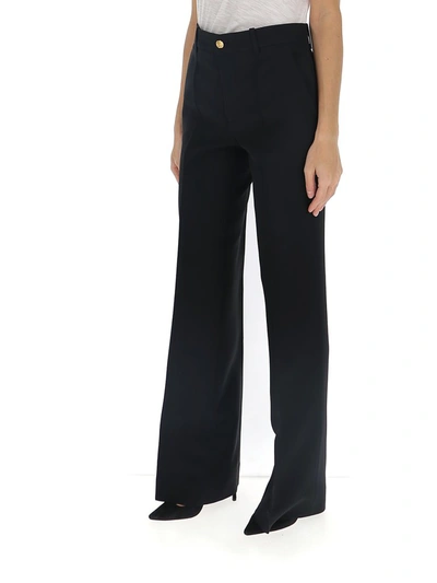 Shop Gucci High Waisted Flare Pants In Black
