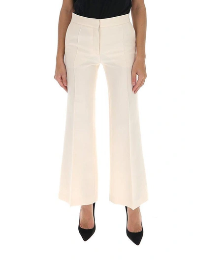 Shop Valentino Cropped Flare Leg Pants In White