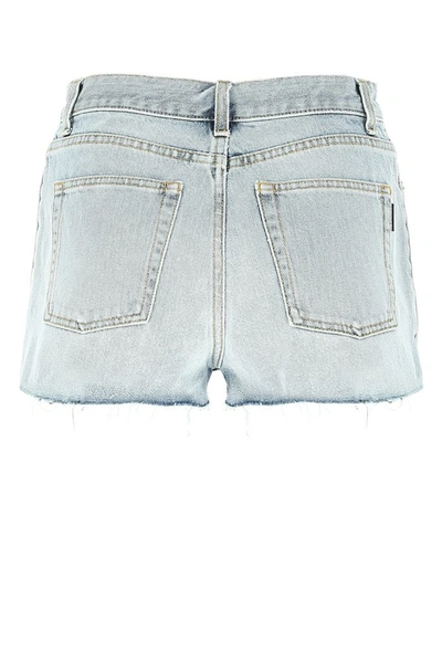 Shop Saint Laurent Distressed Mini Denim Shorts In 4183