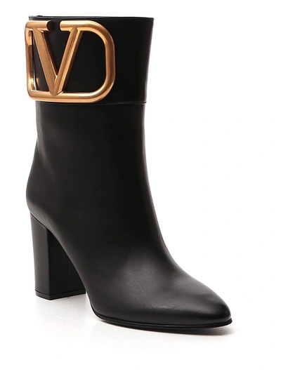 Shop Valentino Vlogo Ankle Boots In Black