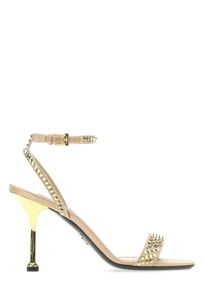 Shop Prada Studded Embellished Sandals In Gold