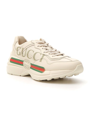 Shop Gucci Rhyton Sneakers In White