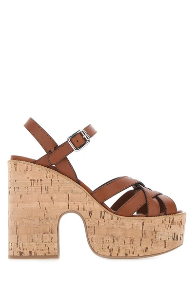 Shop Miu Miu Cork Heeled Sandals In Brown