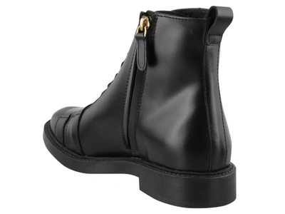 Shop Tod's Buckle Ankle Boots In Black