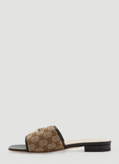 Shop Gucci Gg Matelassé Slides In Brown