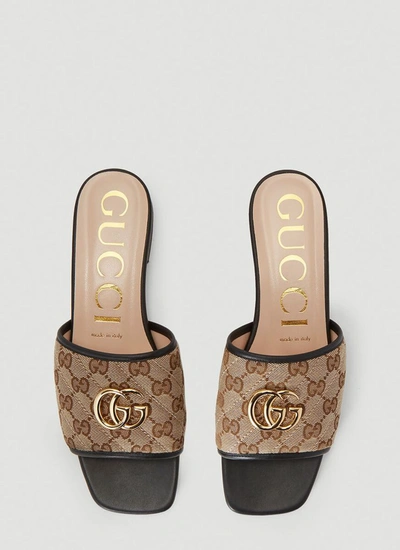 Shop Gucci Gg Matelassé Slides In Brown