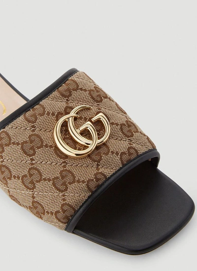 Shop Gucci Gg Matelassé Slides In Brown