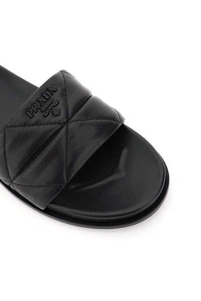 Shop Prada Logo Quilted Slides In Black