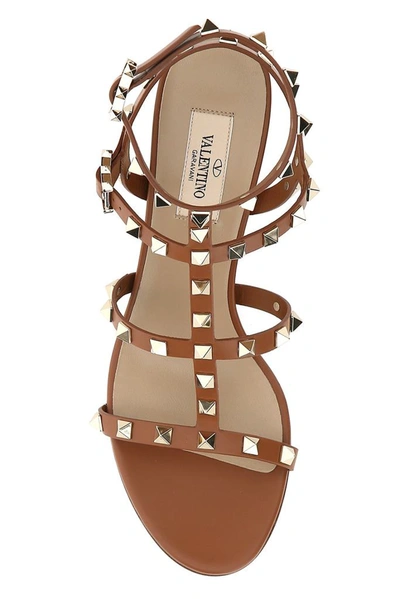 Shop Valentino Garavani Rockstud Caged Sandals In Brown