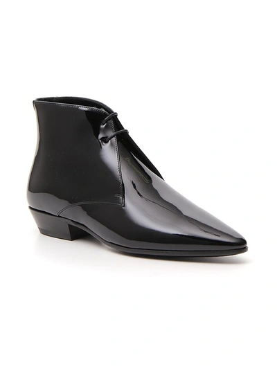 Shop Saint Laurent Jonas Laced Ankle Boots In Black