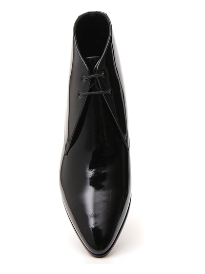 Shop Saint Laurent Jonas Laced Ankle Boots In Black