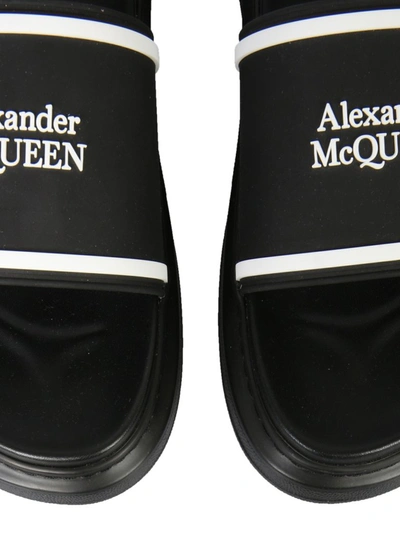 Shop Alexander Mcqueen Embossed Logo Slides In Black