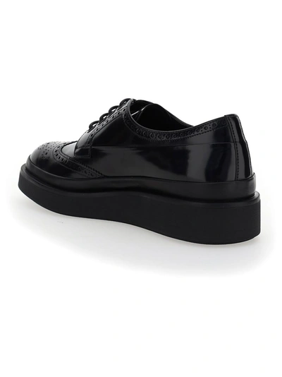 Shop Prada Platform Brogue Shoes In Black