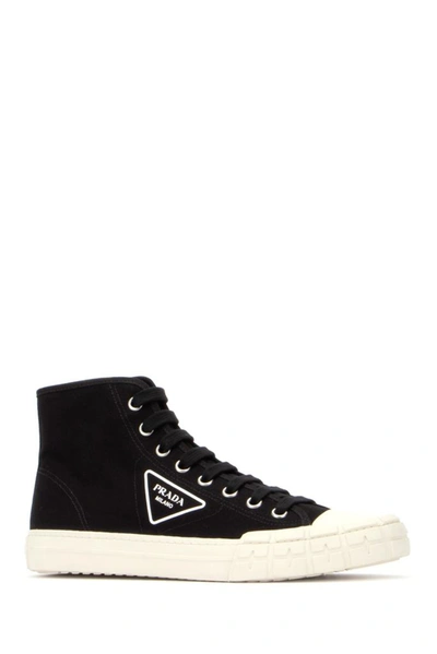 Shop Prada Logo Detailed High Top Sneakers In Black