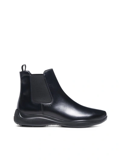 Shop Prada Logo Patch Chelsea Ankle Boots In Black