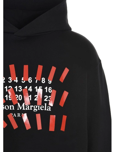 Shop Maison Margiela Tape Print Oversized Hoodie In Black
