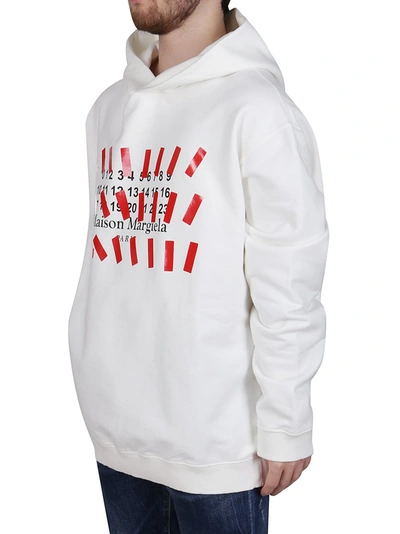 Shop Maison Margiela Tape Print Oversized Hoodie In White