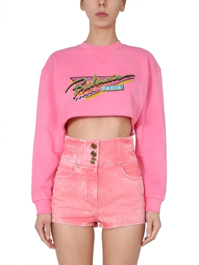 Shop Balmain Logo Embellished Cropped Sweatshirt In Pink