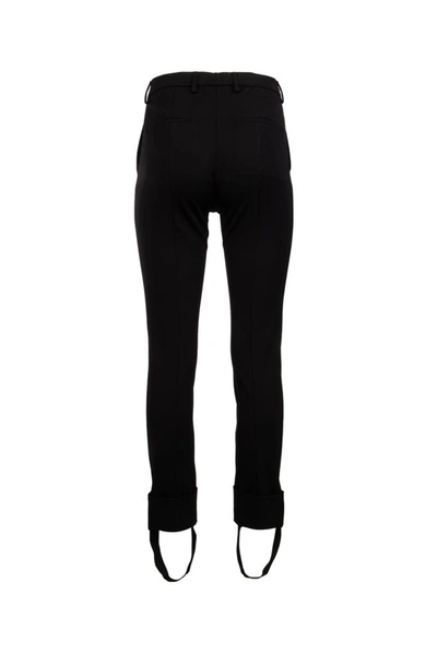 Shop Prada Cuffed Stirrup Trousers In Black