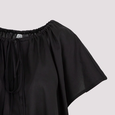 Shop Totême Draped Tunic Blouse In Black