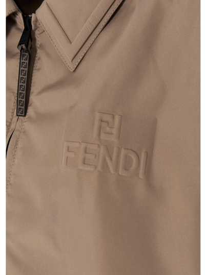 Shop Fendi Logo Embossed Cropped Jacket In Beige