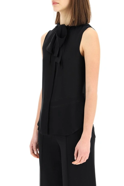 Shop Moschino Hooded Sleeveless Blouse In Black