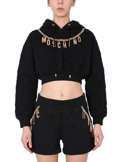 Shop Moschino Logo Chain Hooded Cropped Sweatshirt In Black