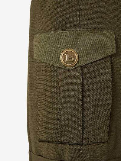 Shop Balmain Peak Lapel Military Knit Jumpsuit In Green