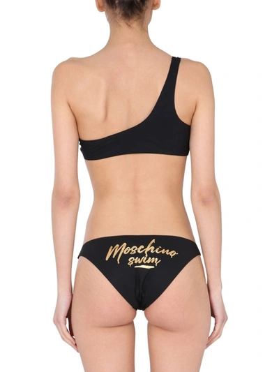 Shop Moschino Logo Print Bikini Briefs In Black