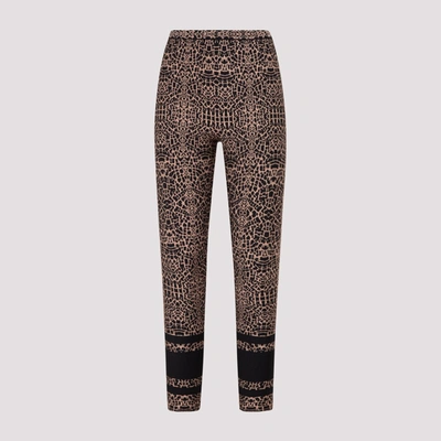 Shop Alaïa Animal Print Leggings In Multi