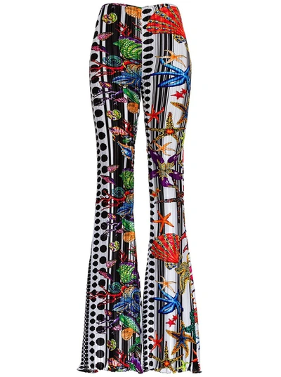 Shop Versace Graphic Printed Flared Pants In Multi
