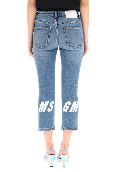 Shop Msgm Logo Printed Cropped Jeans In Blue