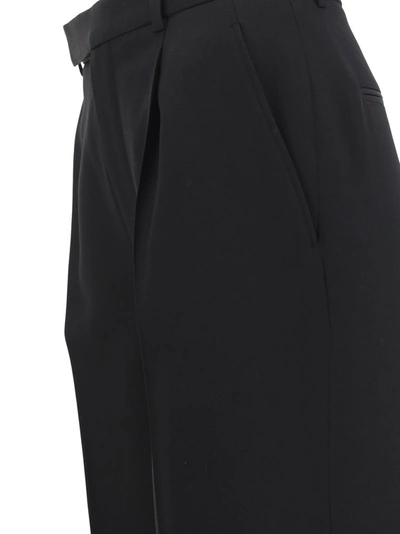 Shop Saint Laurent Tailored Trousers In Black